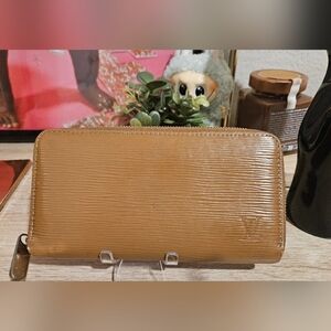 LV Epi Zippy Long Wallet Tan